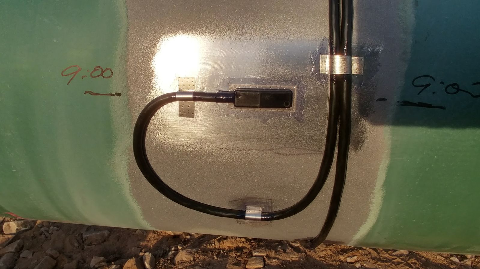 Field-installed sensing hardware on an operating pipeline